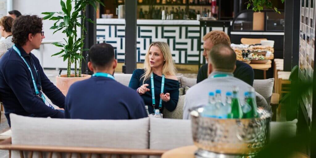 Risk and compliance professionals gather for a peer discussion at ascend grc london 2025, hosted by resolver, with refreshments nearby.