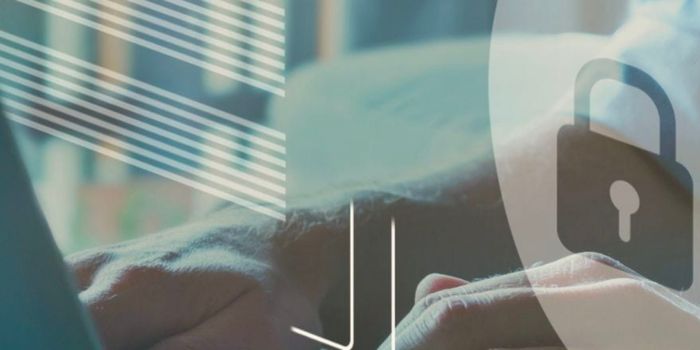 Image of hands on a keyboard with a lock icon to represent incident management