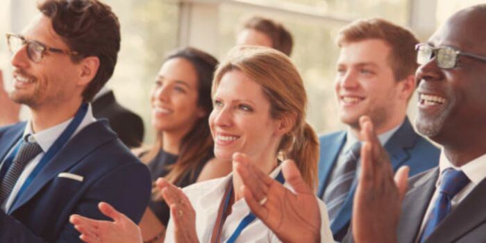 Group of businessmen and businesswomen representing new technology