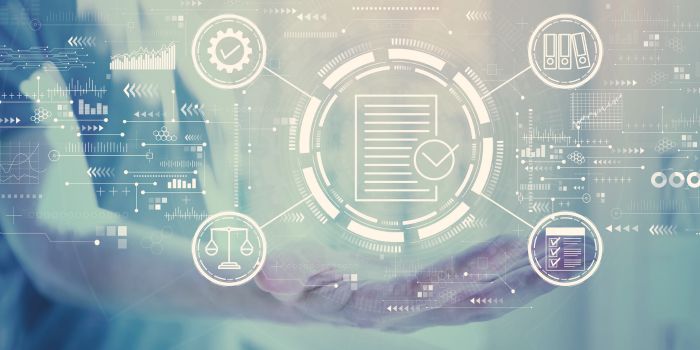 Outstretched male palm with digital icons above representing regulatory compliance