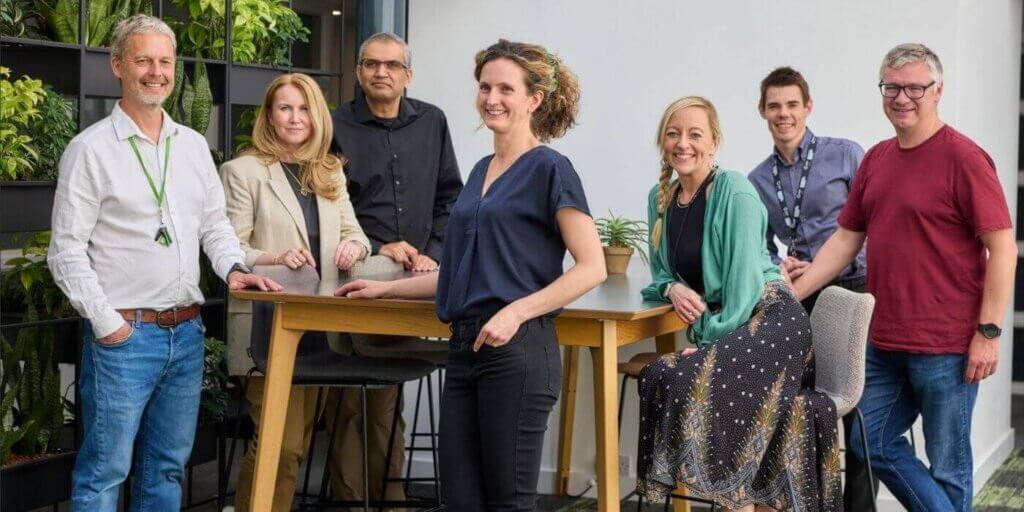 Resolver and internet watch foundation teams at iwf cambridge hq, celebrating a decade of partnership.