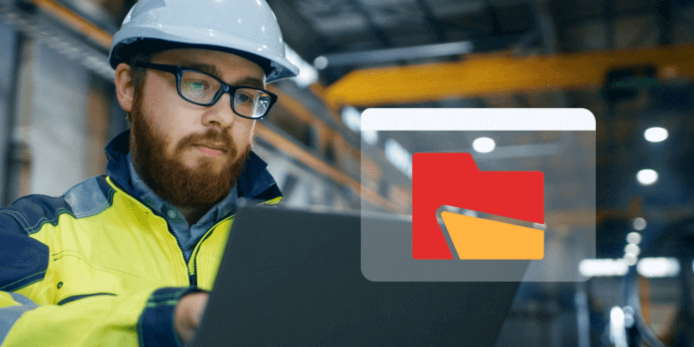 A bearded man wearing glasses and a white safety helmet is working on a laptop in a manufacturing facility. He is dressed in a high-visibility yellow jacket, and the background shows blurred industrial machinery and structures. An overlayed graphic on the right side of the image displays a red and yellow folder icon, emphasizing the importance of documentation or digital management in manufacturing incident management.